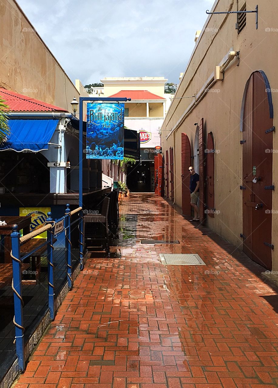 Slick brick alley after a quick rainstorm in St. Thomas.  The bricks were shiny with water and a bit slippery. 