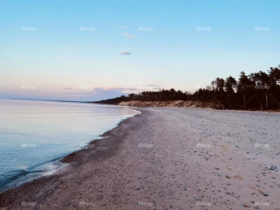 Sandy beach on the shores of Lake Superior in the upper peninsula of Michigan