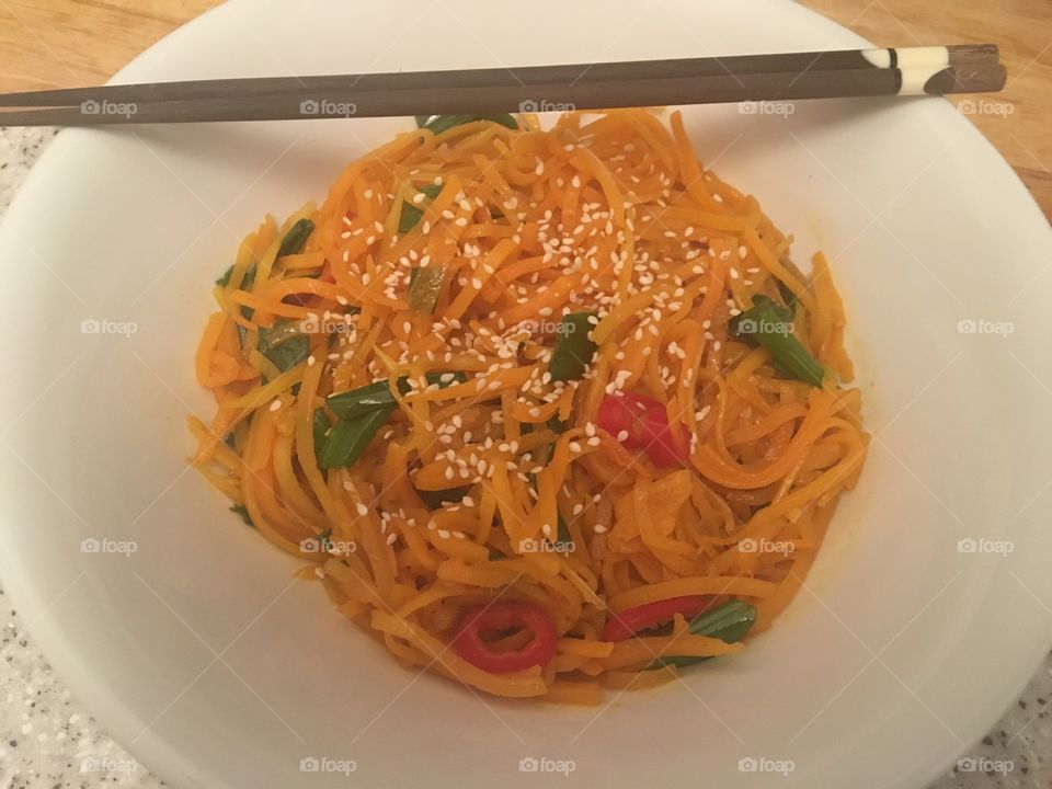 Butternut squash noodles with chili, sesame oil, spring onions and Tom yung paste
