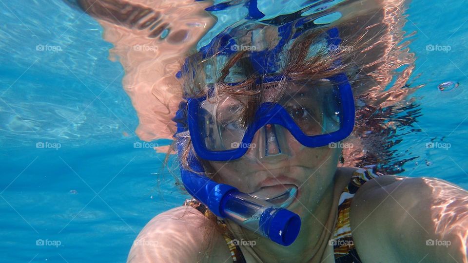 Underwater selfie on the clear blue waters on St. Thomas Sapphire Bay
