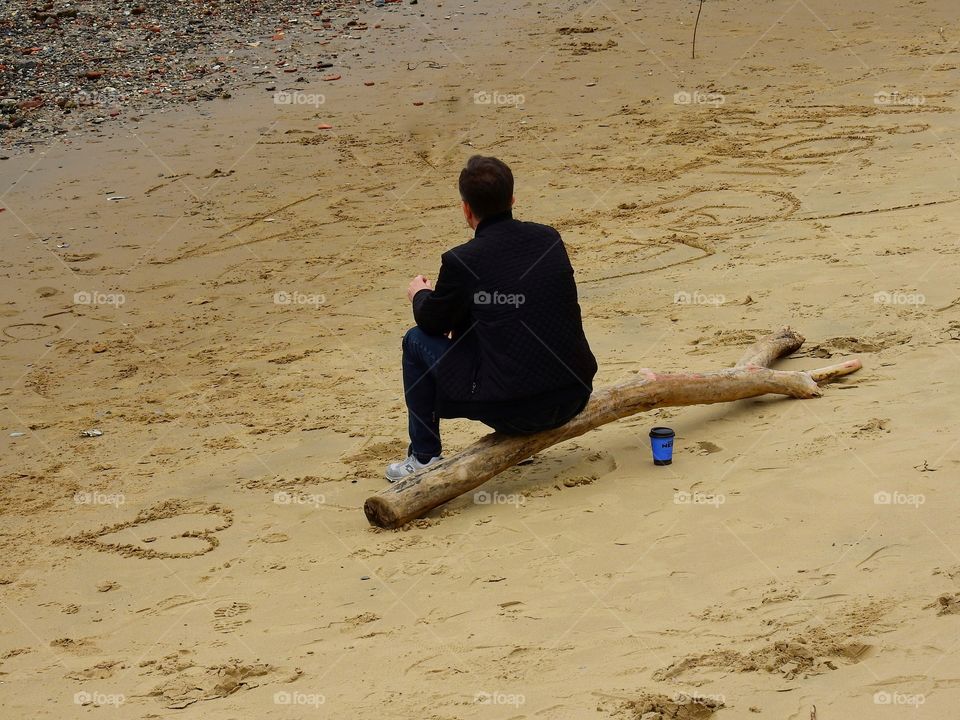 Man on a log