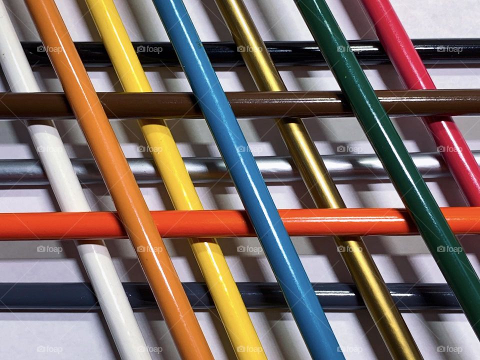 Colored pencil in a row