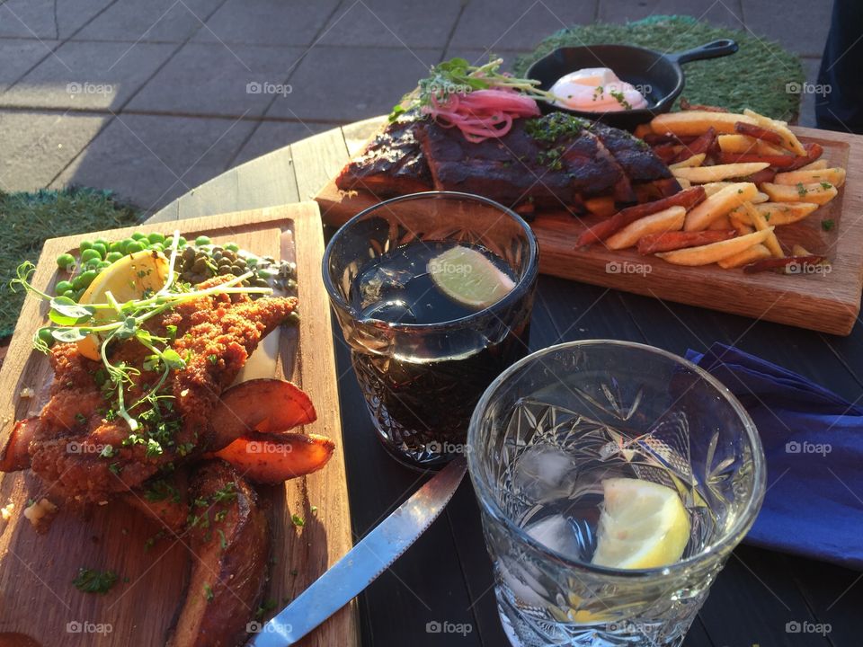 Spare ribs with sweet potato fries and schnitzel