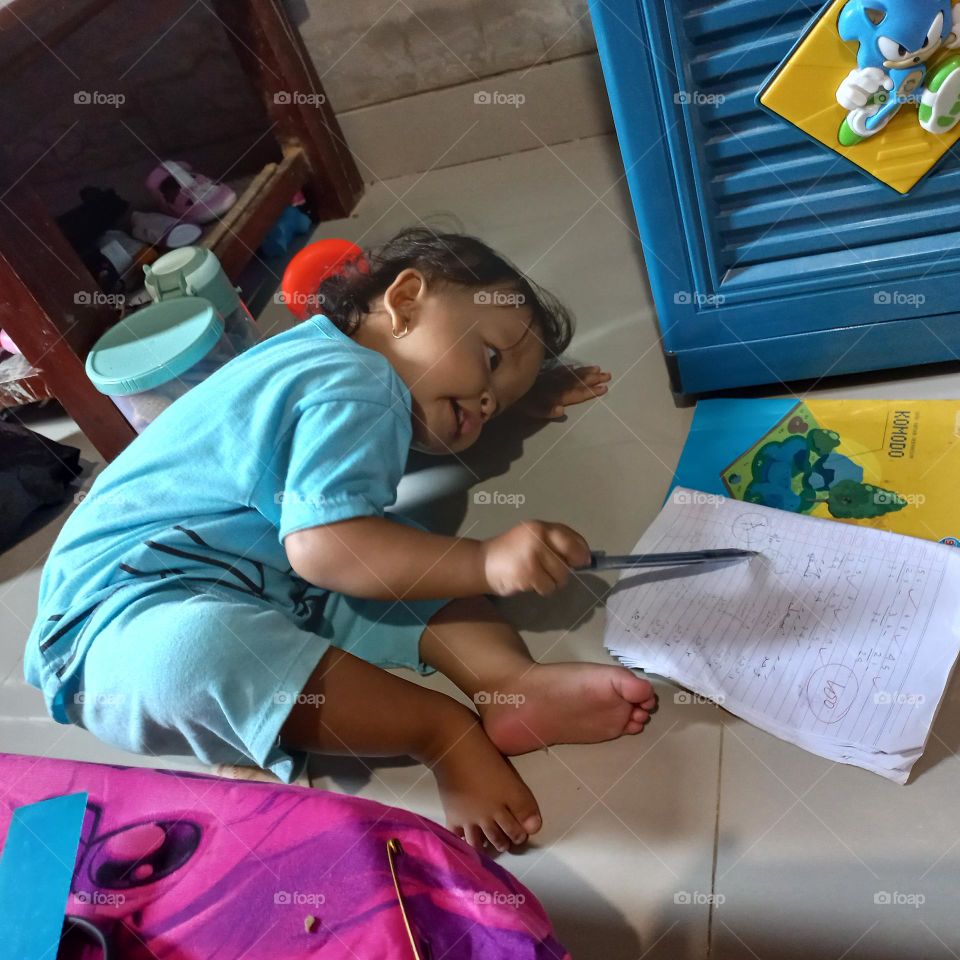Toddlers learning to write