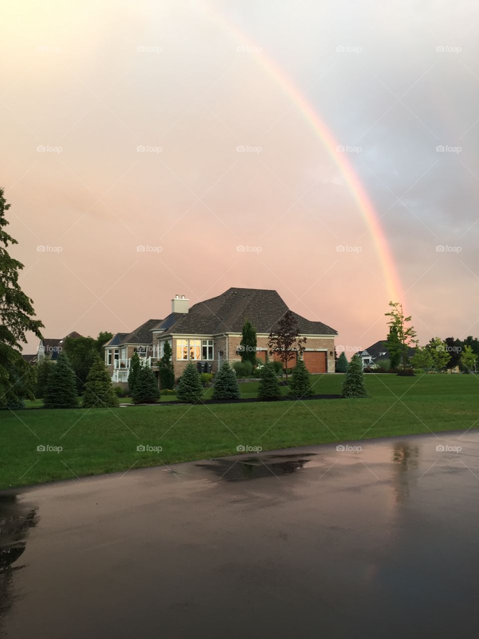 Rainbow over house 