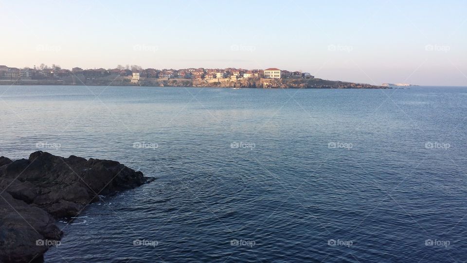 Seascape with houses