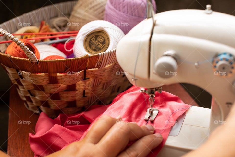 Working at the sewing machine