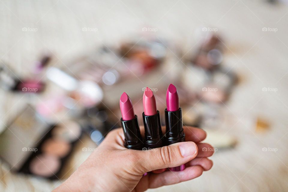 Lipsticks in hand 