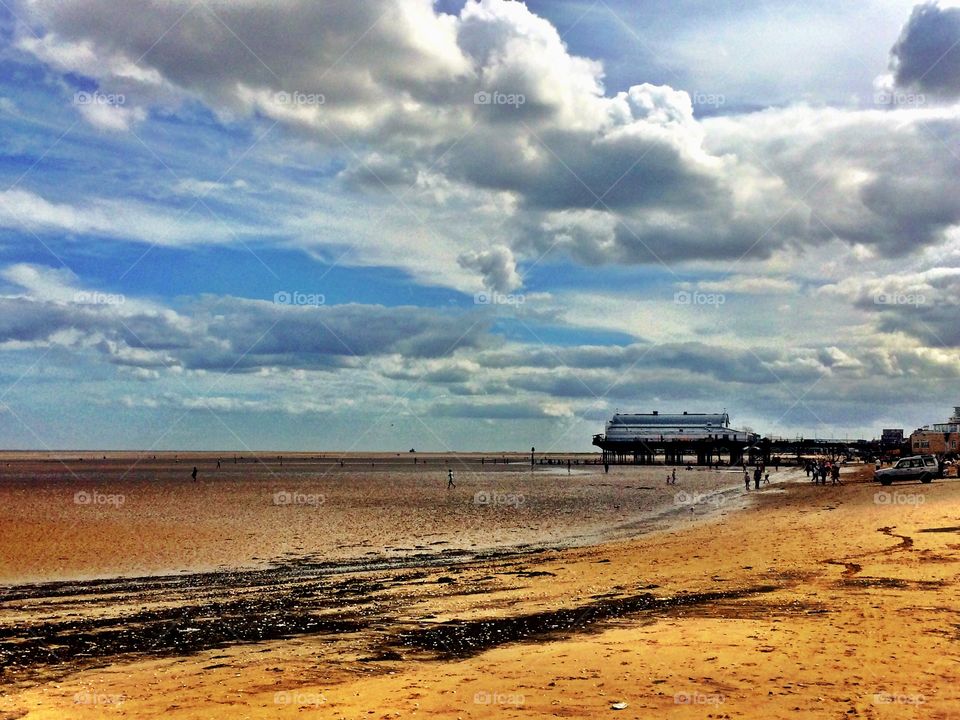 Seaside pier and beach