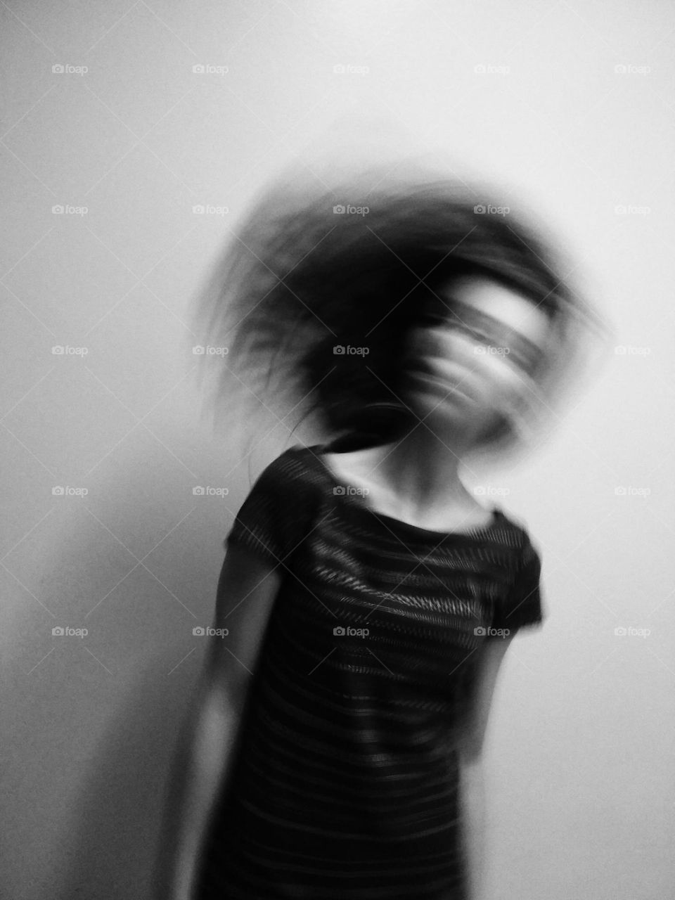 Black and white portrait. Hair motion