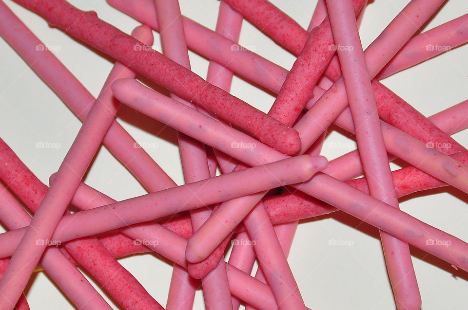 Strawberry cream covered biscuit sticks