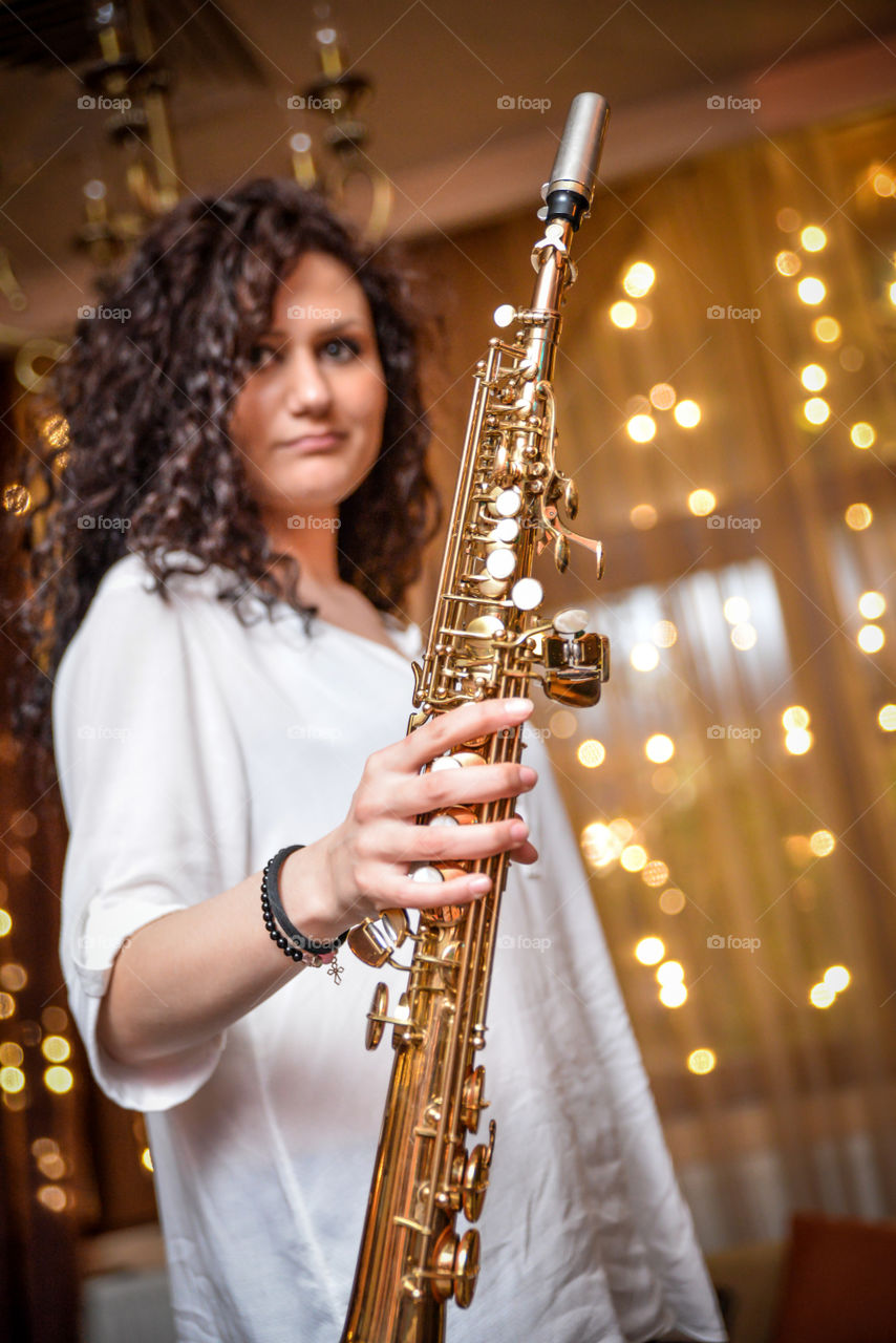 Girl with classical soprano sax
