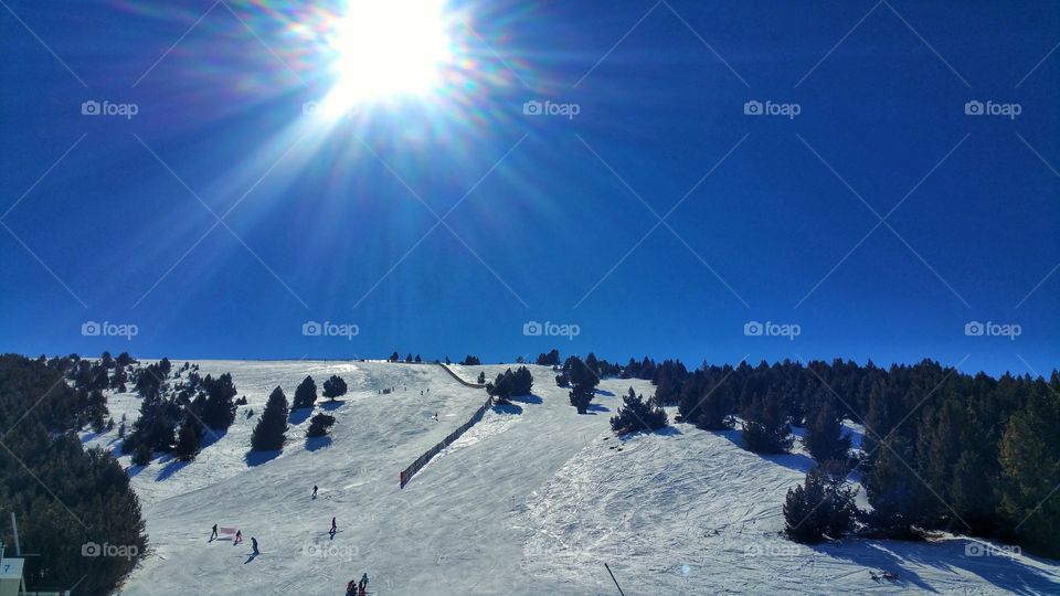 Ski slopes in the sun.