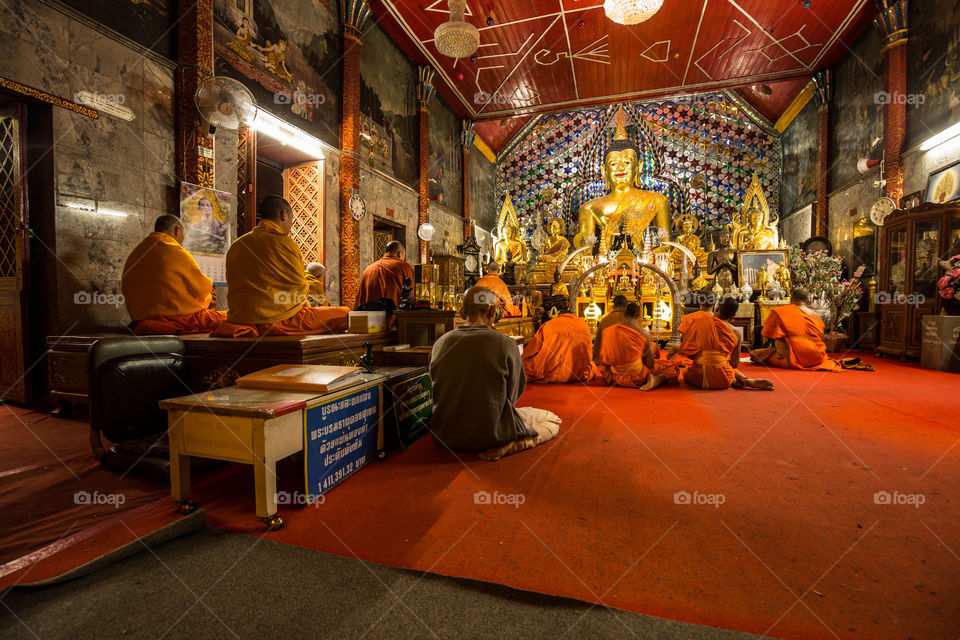 Monk pray in the temple 