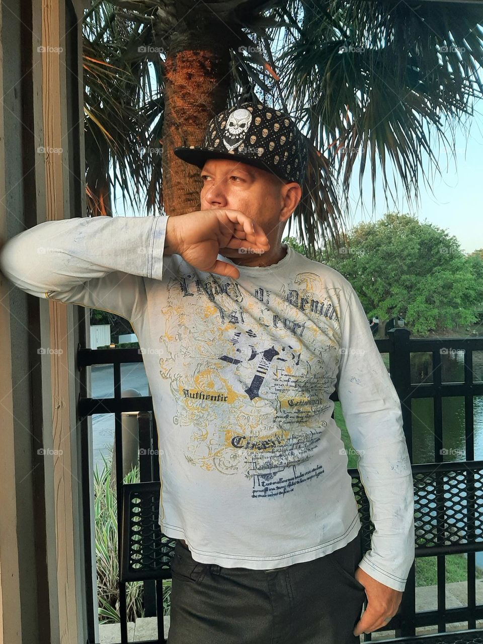 waiting with stile outdoors making statement.