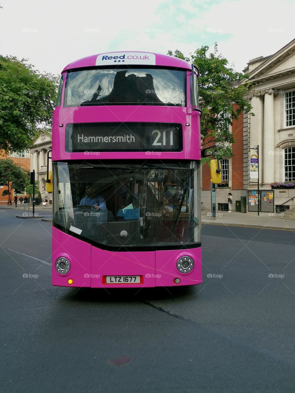 Pink bus. London roads. Nice pink color.