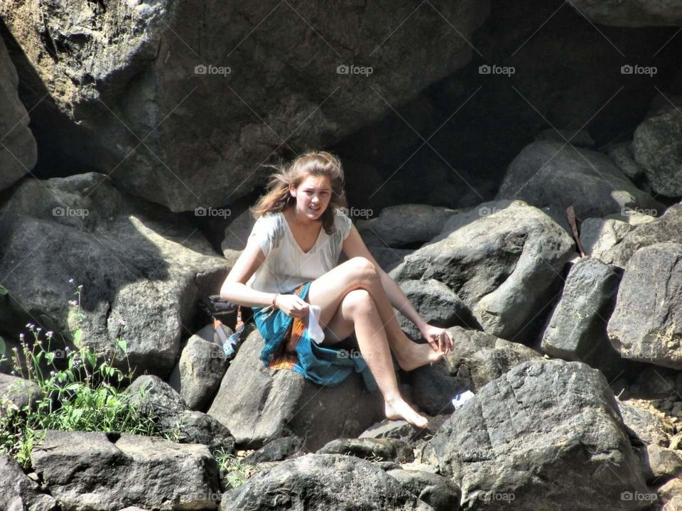 sitting on a rock to get restrictions