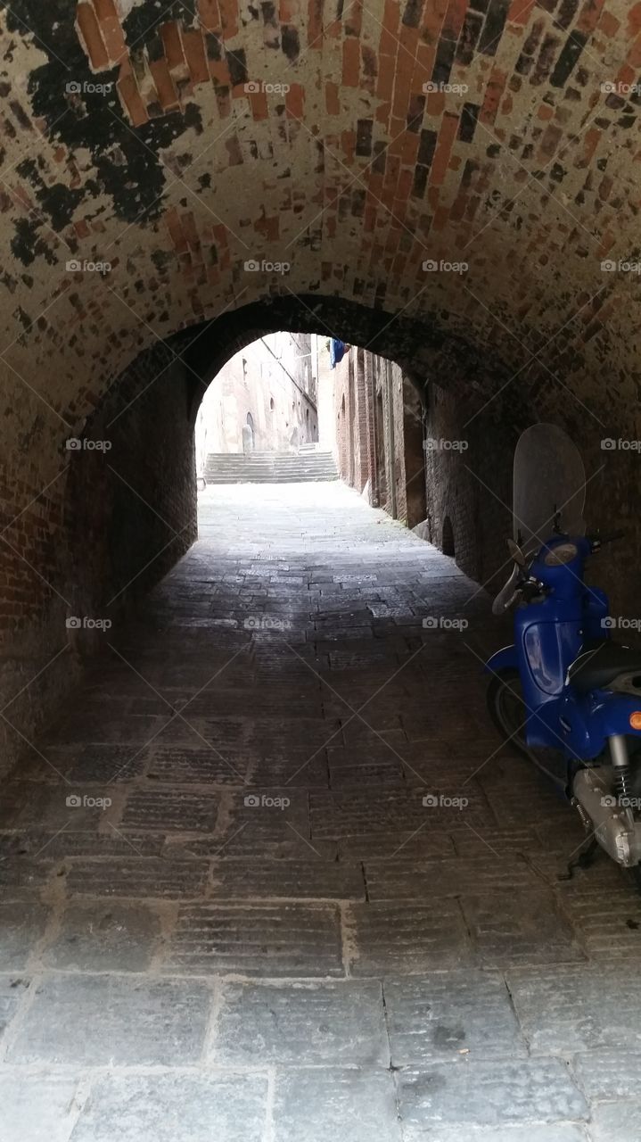 Italian moped in tunnel