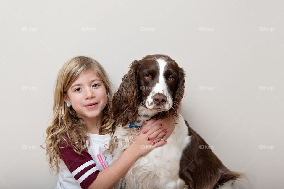 Smiling girl with her dog