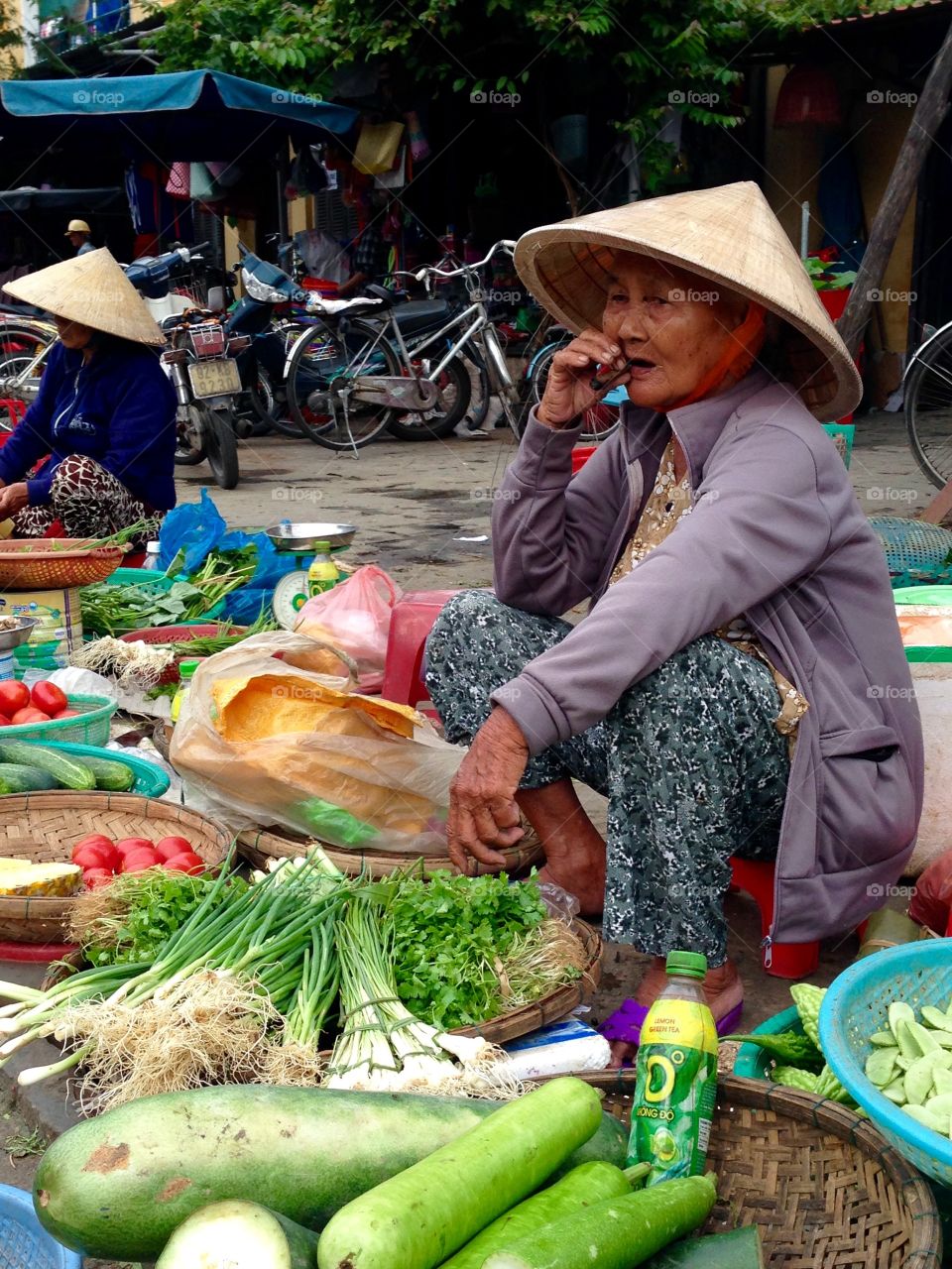 Old woman selling vegetable
