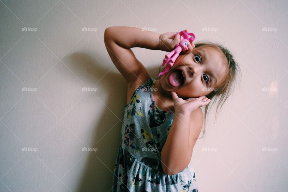 Close-up of a girl in funny expression