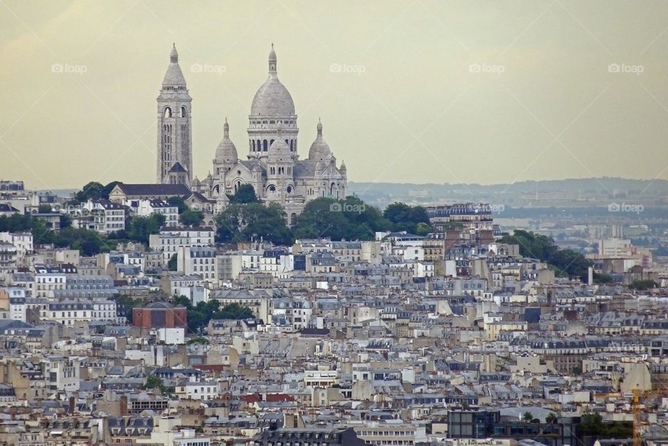 Paris with sacre coeur with cloudy sky in day