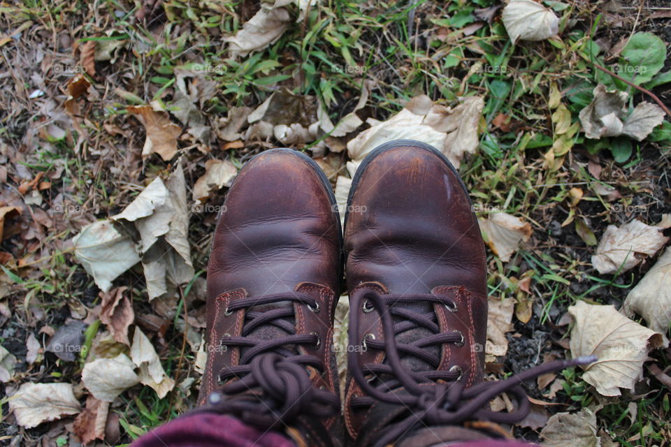 Boots to get ready for a long hike during a sunny autumn day