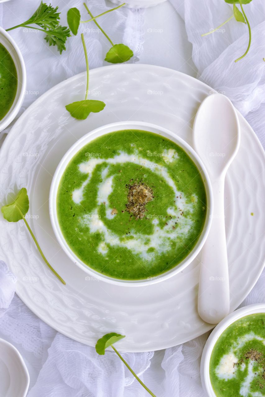spinach soup served in a bowl