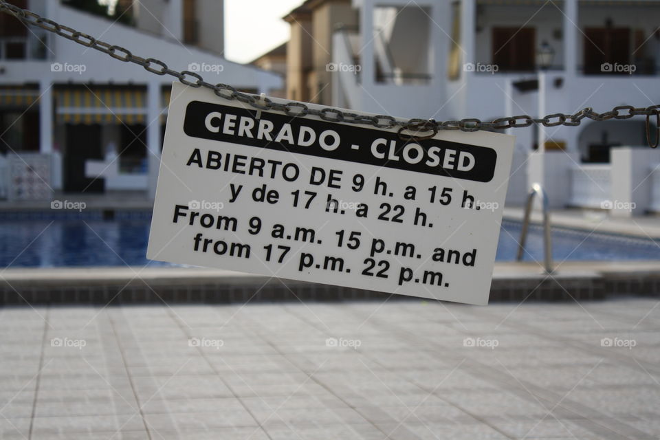 Sign. Even the pool is closed while it is siesta. 