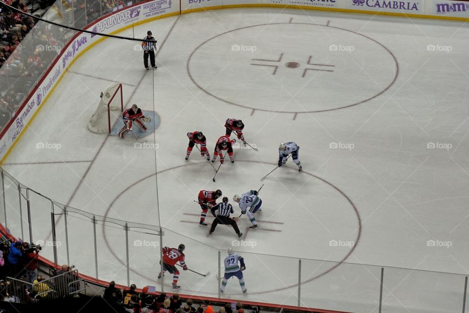 Hockey Face-off  in Devils Zone 