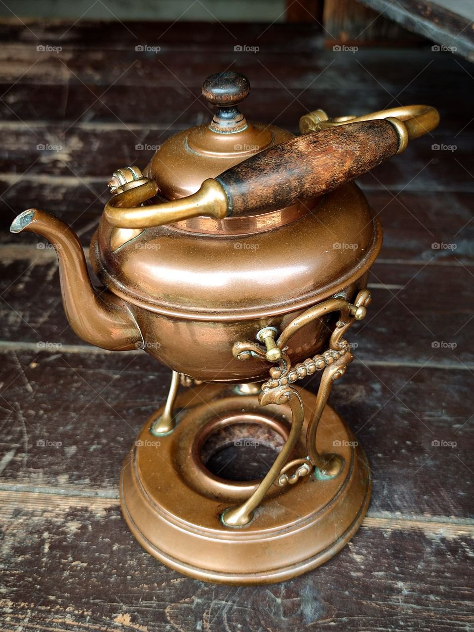 old copper kettle on a spirit lamp