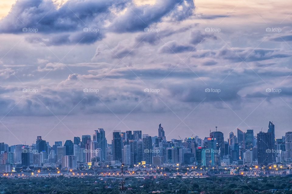 Beauty cloudy and golden sky before sunset above silhouette of the Bhumibol landmark bridge in Bangkok Thailand
