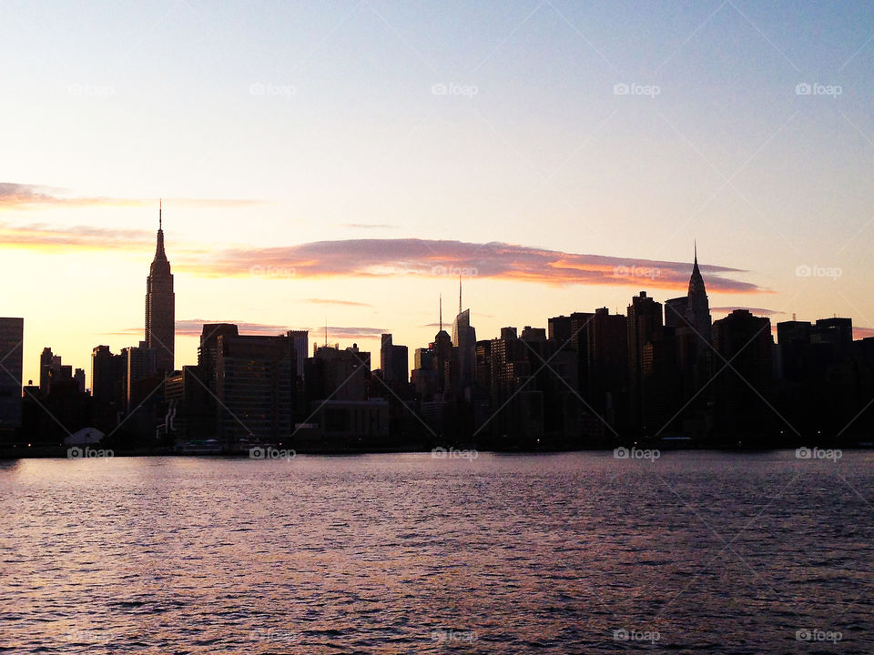 Manhattan skyline on sunset