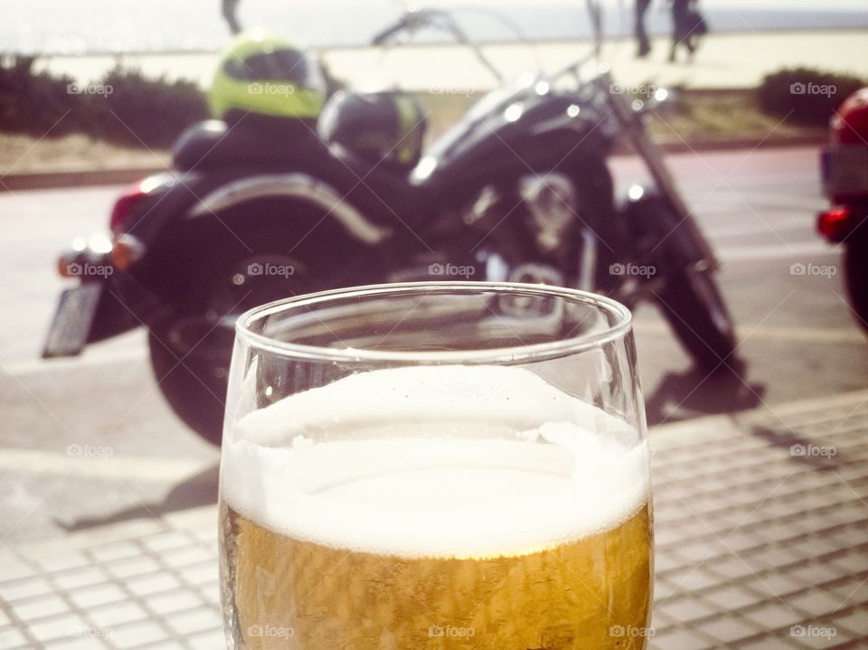 Drinking a beer in the sun after a motorcycle ride