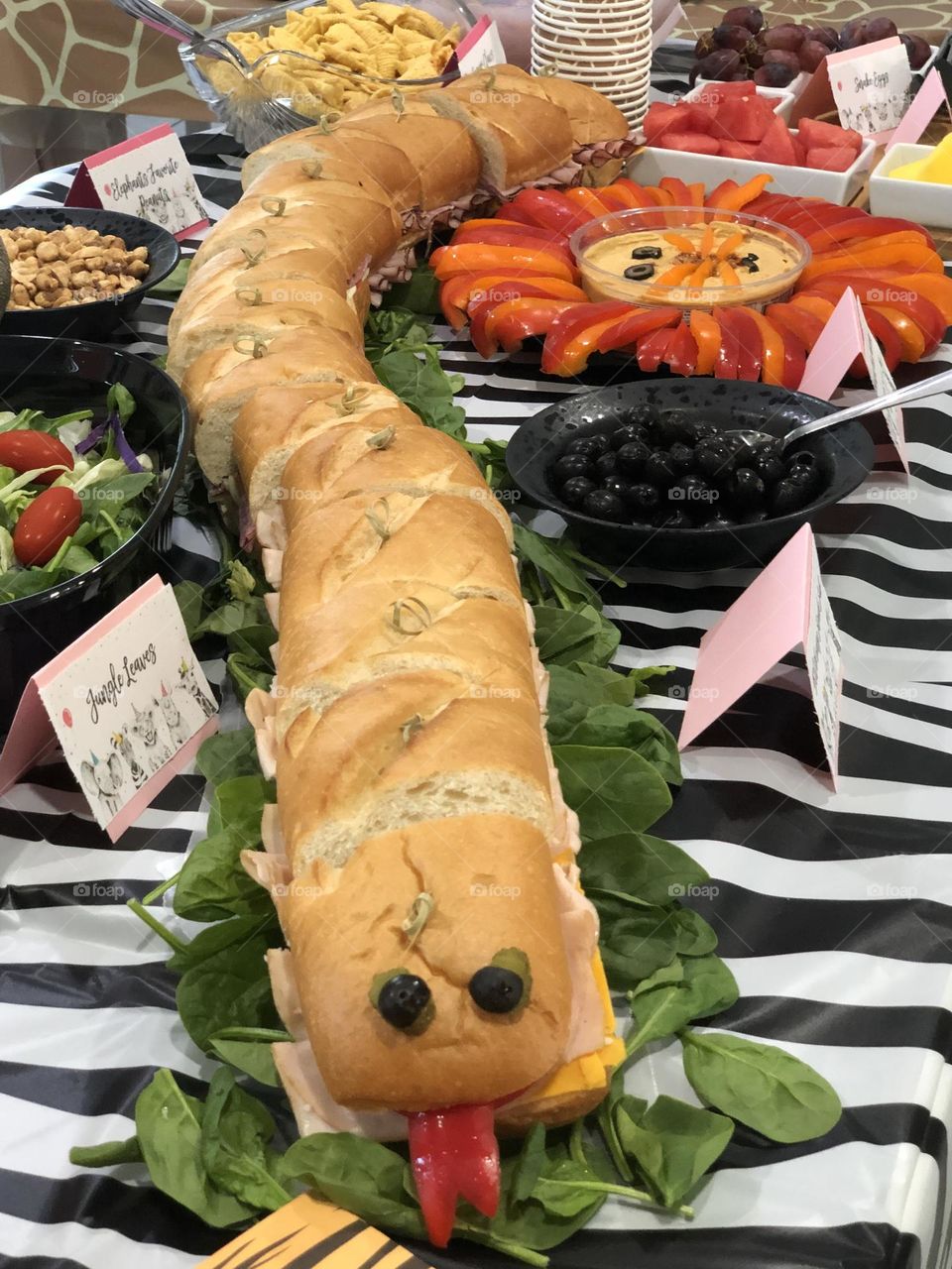 Sub sandwich in a snake shape for a jungle themed party 