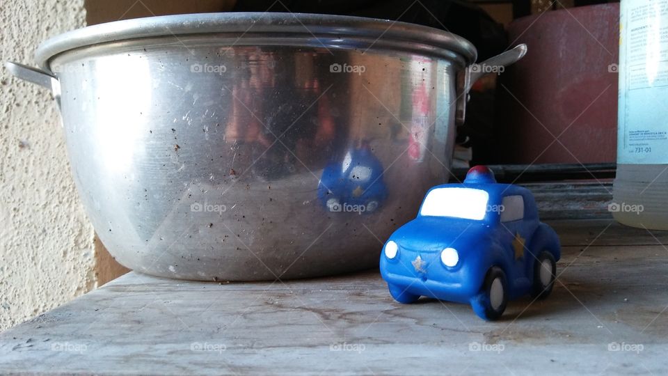 Pot and blue stroller