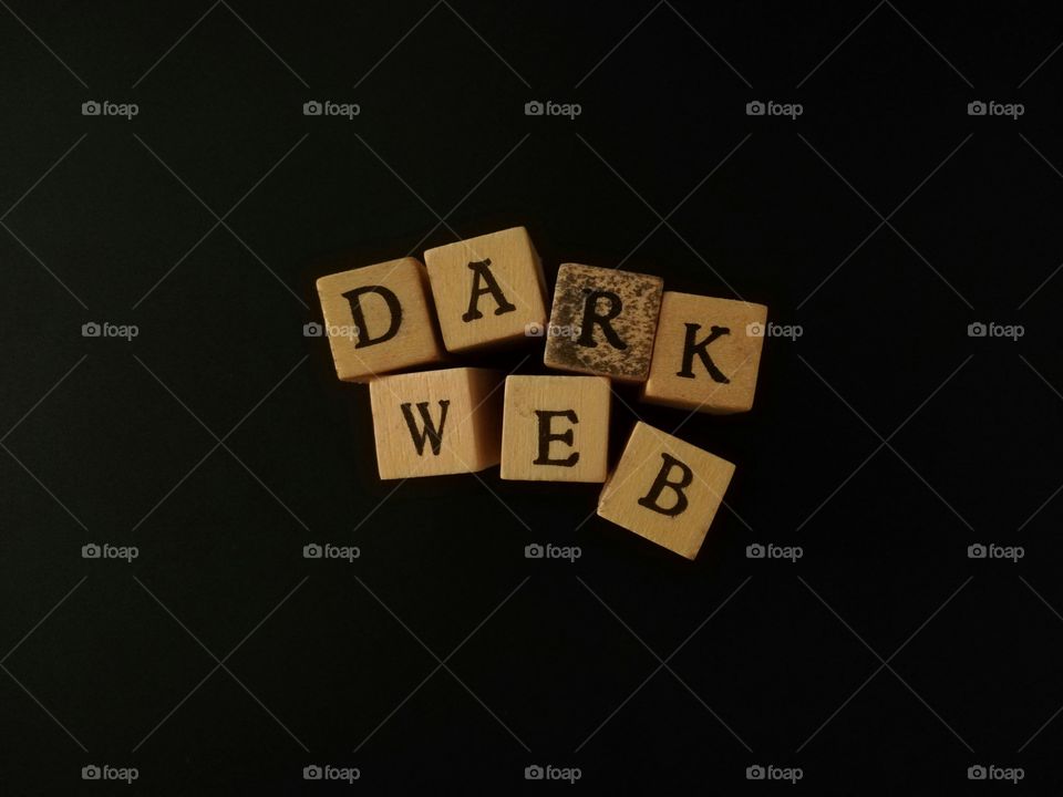 Dark web lettering on black background