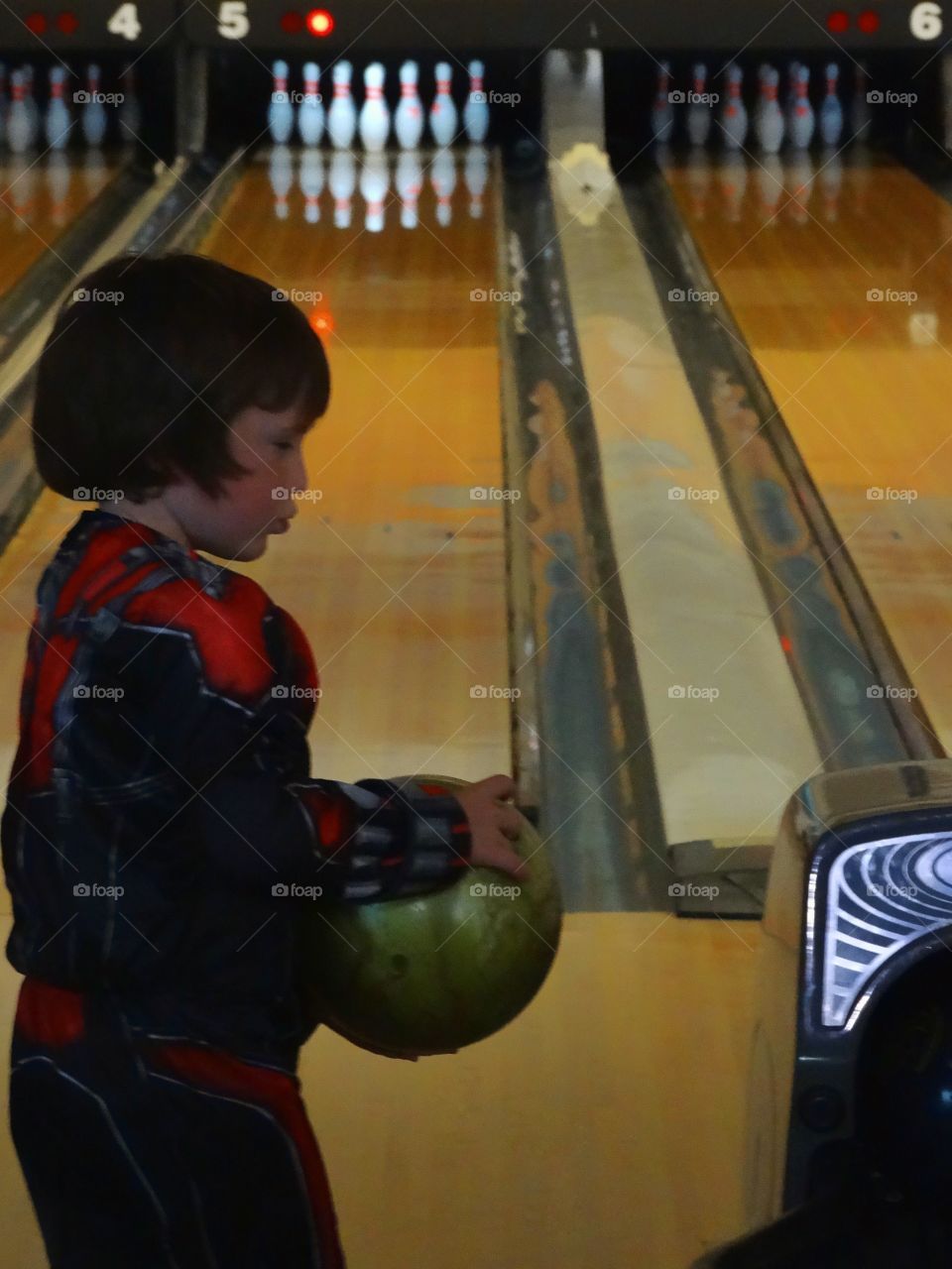 Boy In Bowling Alley
