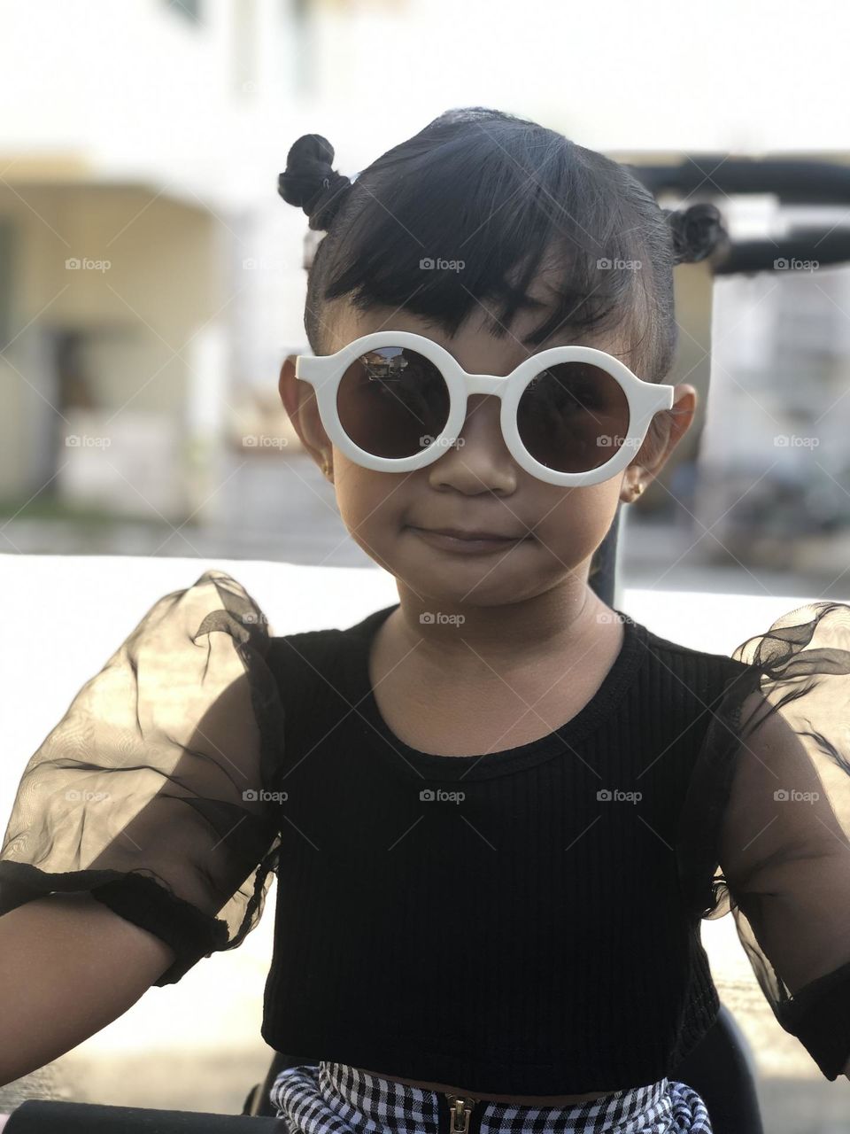 A cute fashionista toddler