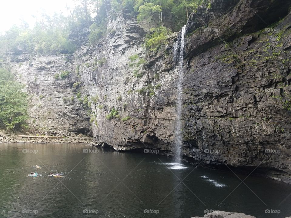 swimming near the waterfall