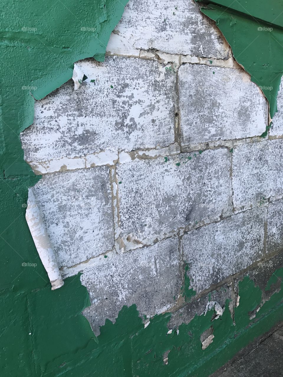 Stone Wall With Peeling Paint