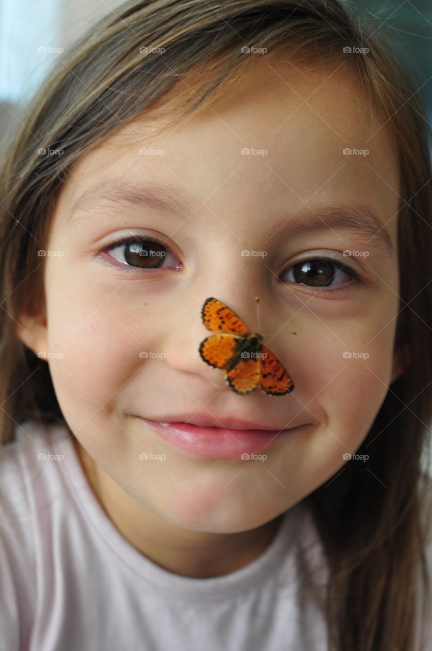 Girl with butterfly