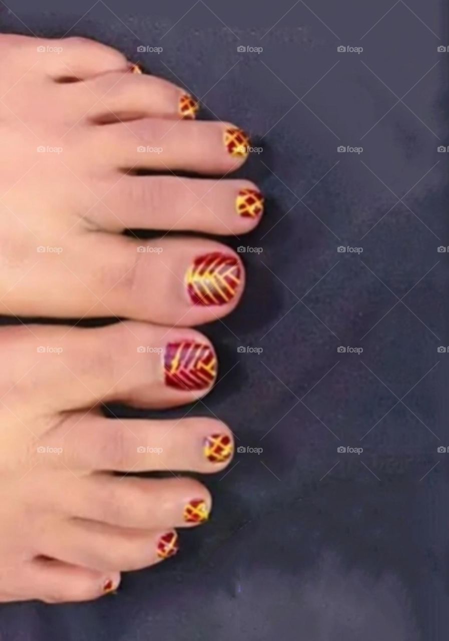 The nail polish on my toes.