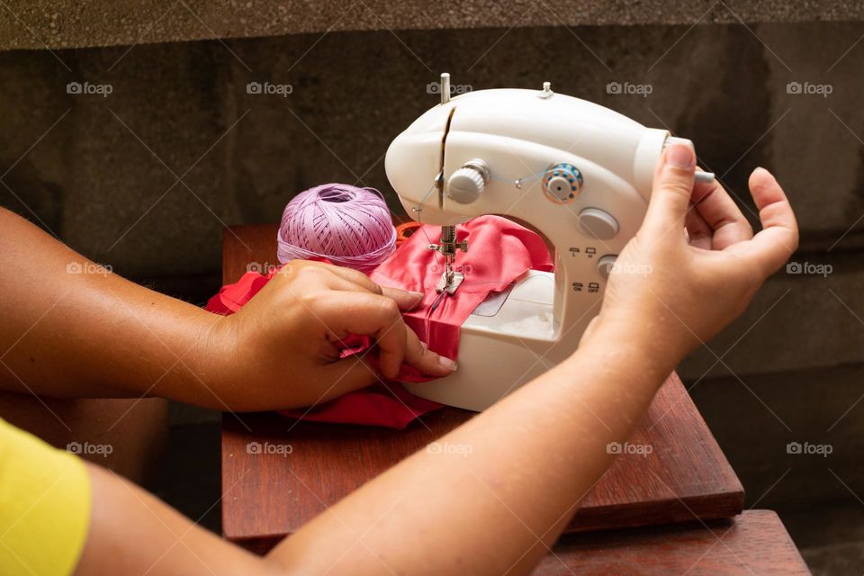 Working at the sewing machine