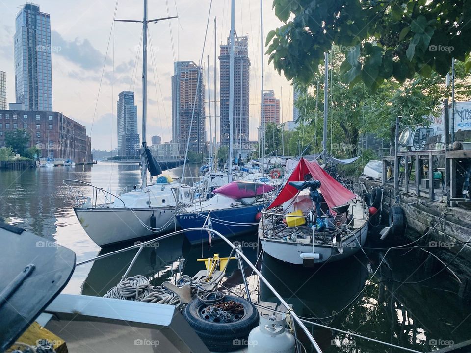 What a beautiful view !!! The boats of “Newtown Creek” in LIC, Queens are stretching out before you when you see them from aboard one of them. 2023. Hypnotic Productions