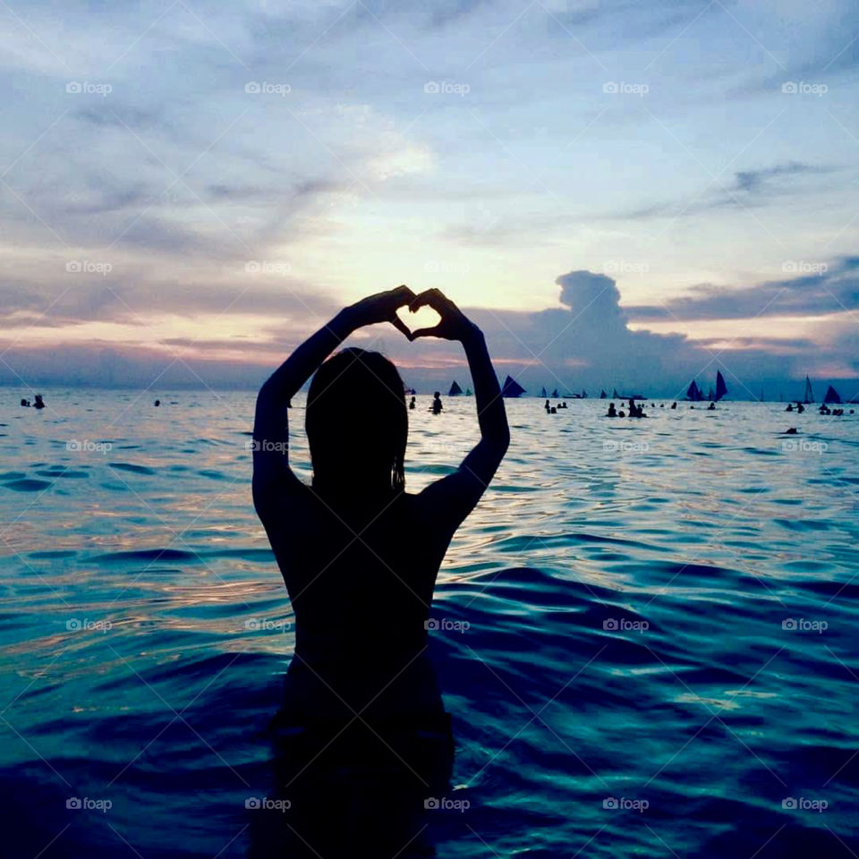 Silhouette of a girl at the beach