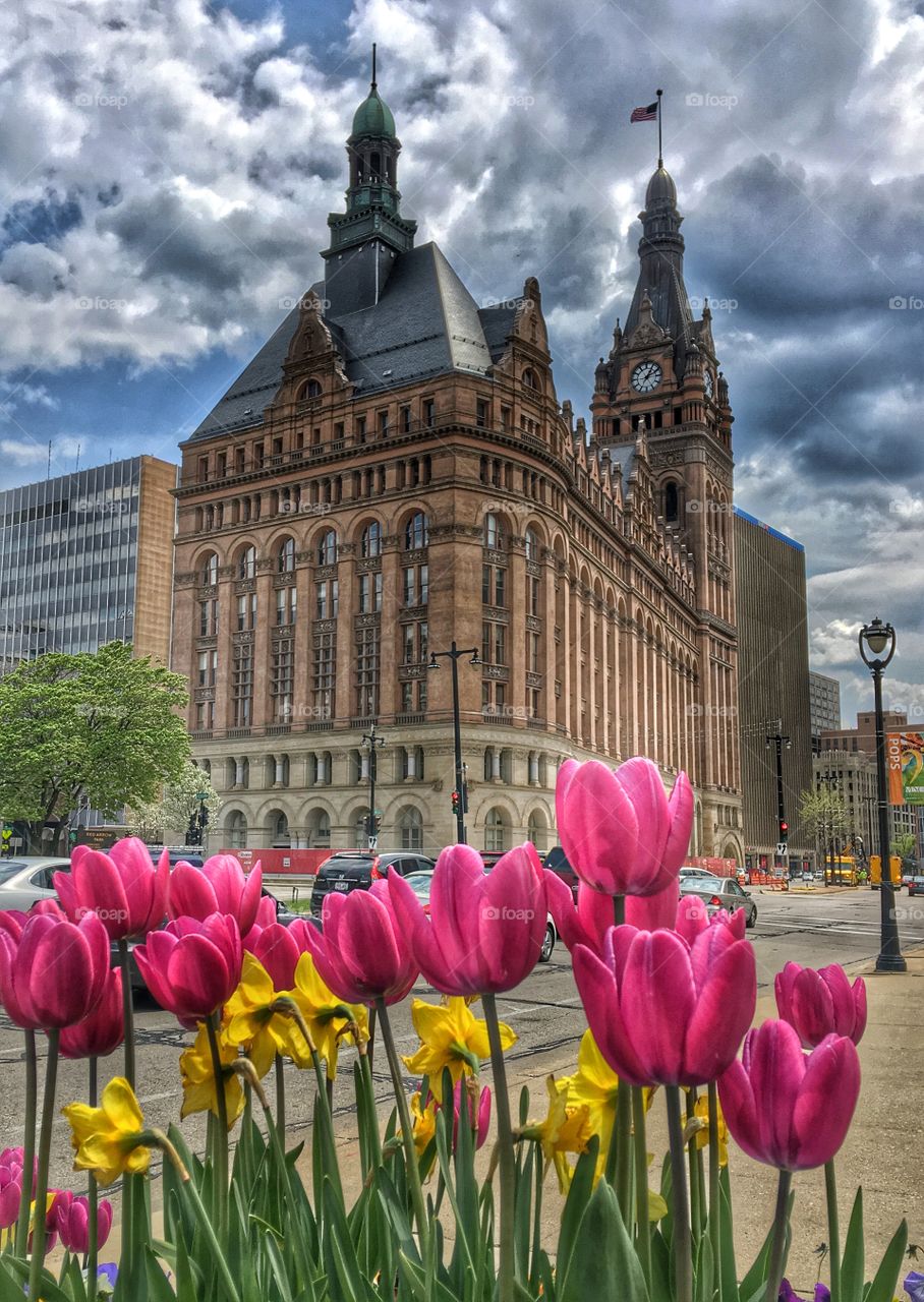 Ancient building against cloudy sky