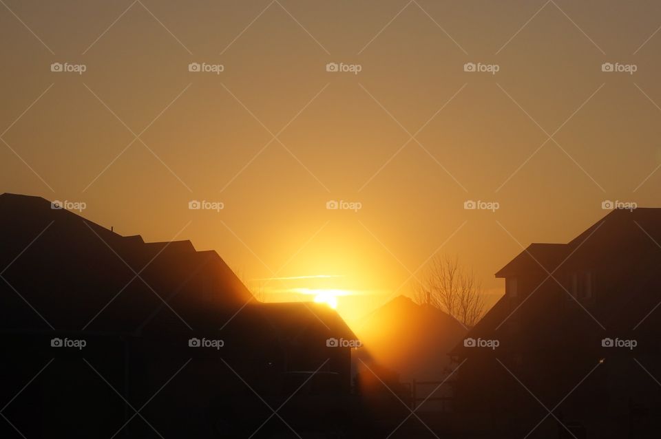 Yellow sunrise. Foggy morning