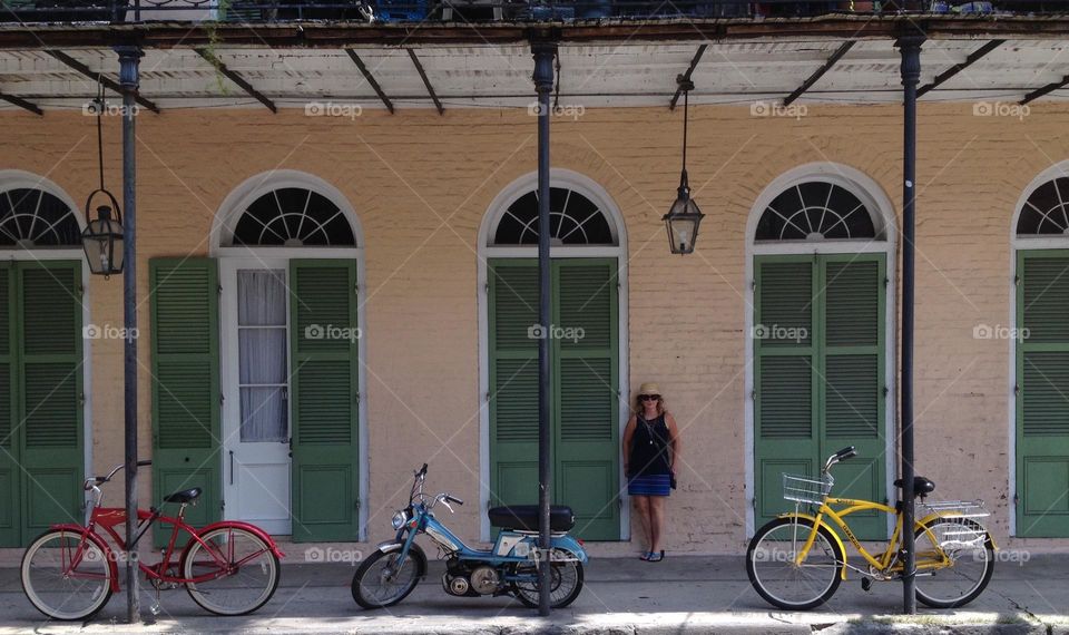 Almost staged. My wife and I were walking around the French Quarter in New Orleans when I saw these three bikes. 3 primary colours! Almost seemed staged.