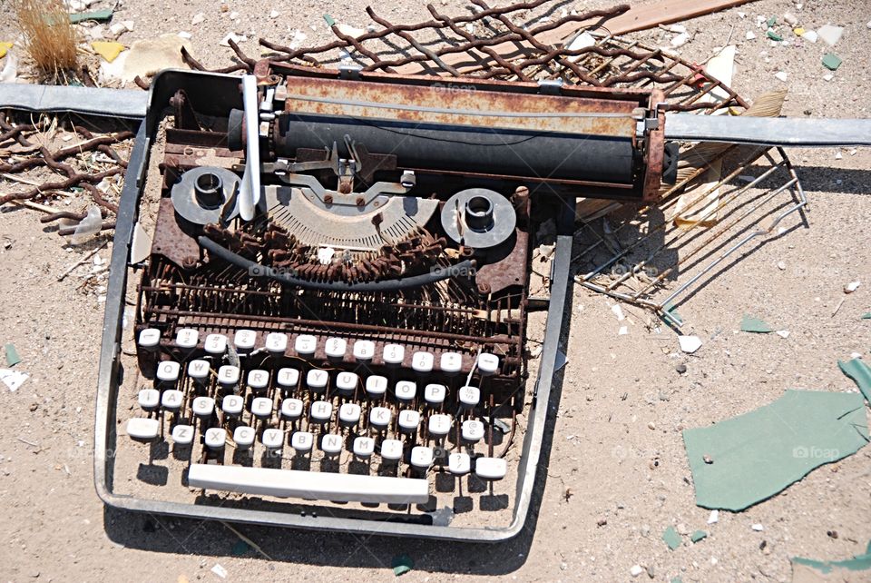 High angle view of abandoned typewriter